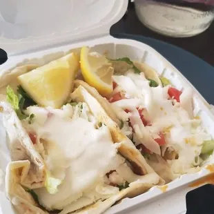 Left: Carnitas Taco Deluxe Right: Tinga Taco Deluxe