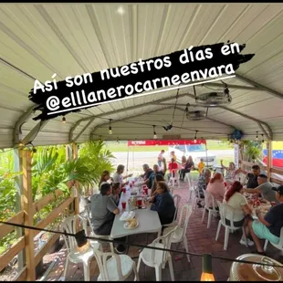 a group of people sitting at tables