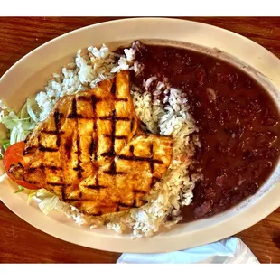 El Llano Restaurant. Specials 7.95$ !  Chicken with Beans  Rice and Salad. Very Good Deals!  Great Simple for Lunch! Cool!