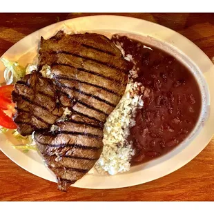 El Llano Restaurant. Specials 7.95$ !  Ribeye Steak with Beans  Rice and Salad. Very Good Deals!  Great Simple for Lunch! Cool!