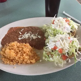 Vegetarian Tacos with avocado, cactus, lettuce, tomato, cheese, salsa, etc