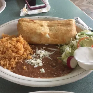 Chicken Chimichanga with a side of Rice and beans