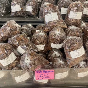 a display of chocolate covered donuts for sale