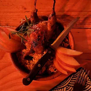 Whole roasted quail Spiced plum glaze, bamba rice, rosemary