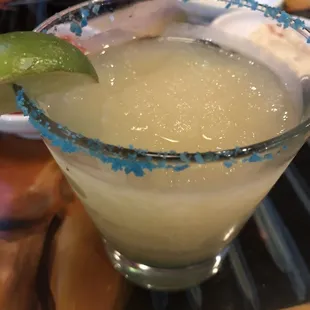 Blended lime margarita with blue salt