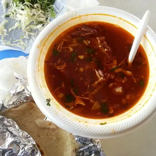 Birria de chivo (shredded goat in red chile broth)