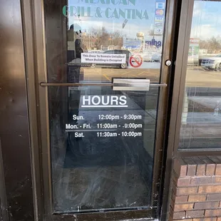 Outside door with hours