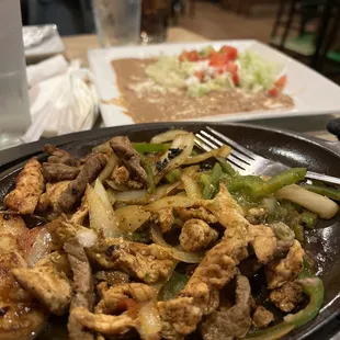 Texas fajitas- Steak, Chicken, and Shrimp