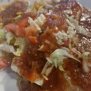 Lunch Number 11, Beef Burrito served with Mexican Rice and Refried Beans.