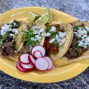 Legit cabesa taco on the left, and then barbacoa, al pastor, and asada.