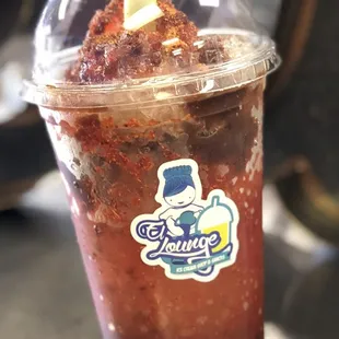 a cold drink in a plastic cup