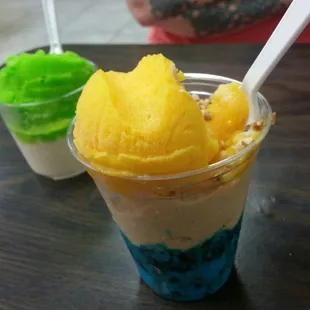Mango on top of pecan n cookie monster, the other is lime and queso