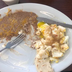 Huevos Rancheros so delicious! The white cream sauce and their green chili is an amazing combination! So delicious!