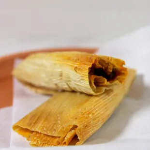 two tamales on a plate