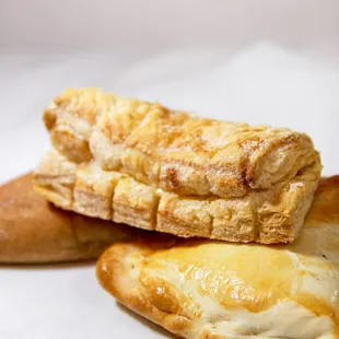 two pastries on a white surface