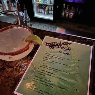 a margarita and a menu