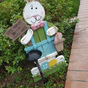 Hello Mr. Bunny Rabbit! ... you're getting wet out in somebody's front yard lol