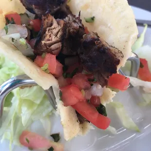 Grilled steak a la carte Soft Taco. Dry, thin, burned steak. Bummed it&apos;s not like the other photos of steak tacos!