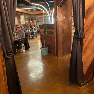 a view of a restaurant through a doorway