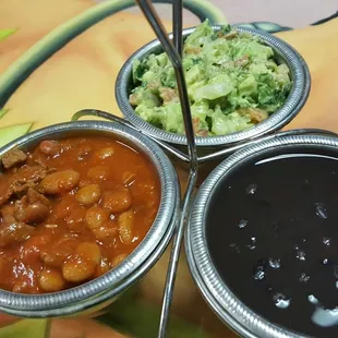 three bowls of chili and beans