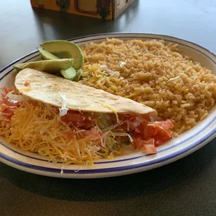 Taco lunch with avocado and rice