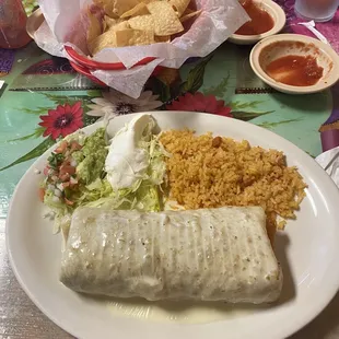 Chimichanga w/ steak,chicken,sausage,rice,pico,lettuce,sour cream and avocado.