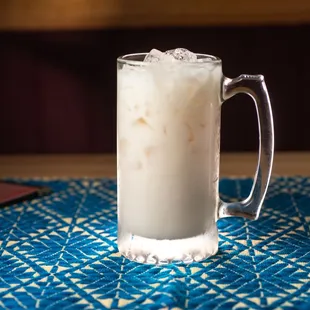 a drink in a tall glass