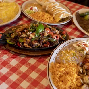 plates of mexican food on a table