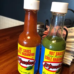 Two chili habanero sauces at every table