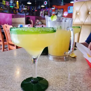 a margarita with a lime garnish