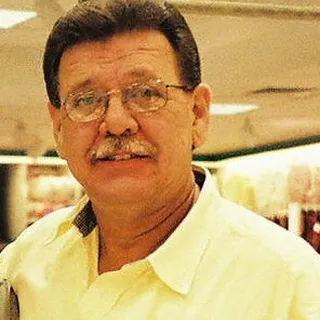 Claude E.