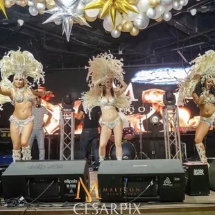 a group of dancers on stage