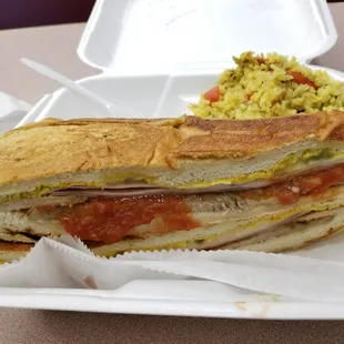 a sandwich in a styrofoam container