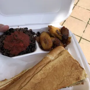 Cuban sandwich, black beans and rice topped with spicy salsa, and plantains.