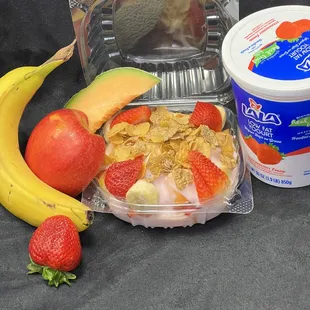 a bowl of fruit and yogurt