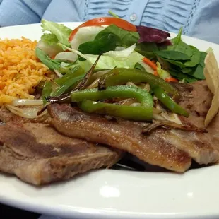 Chuletas (pork chop) plate, so good.