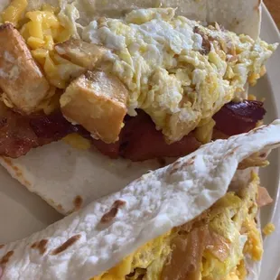 Bacon, Egg, Potato &amp; Cheese taco, and a migas and cheese taco