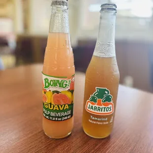 two bottles of orange juice