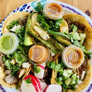 Tacos pastor, lengua, y asada.