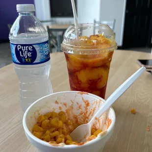 Agua, mangonada, corn in a cup