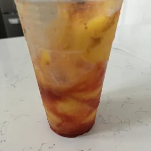 a drink in a plastic cup