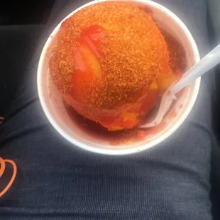 Nanche and strawberry sorbet with chile powder and chamoy