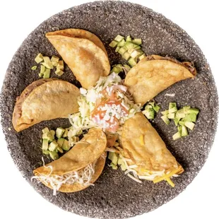 Crispy Tacos- Shredded Beef, Chicken, Spicy Potato, Potato &amp; Cheese or Refried Bean.