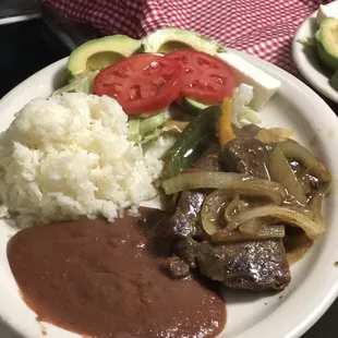 BISTEC ENCEBOLLADO
