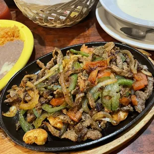 Shrimp and steak fajitas