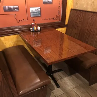 a table and benches in a restaurant