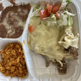 Carne asada with a shredded beef enchilada rice and beans wasn&apos;t that