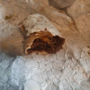 Super yummy looking, tastes as good as it looks burrito, half gristle,  half Carne asada jerky,  very dry, probably going to the dogs,