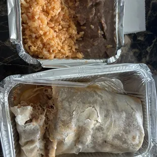 Burrito with mexican rice and refried beans