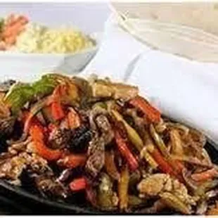 a plate of stir fried vegetables